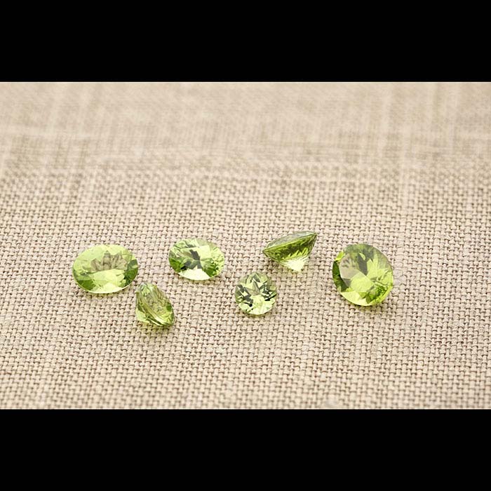 American Mined™ Arizona Peridot 5mm Round Faceted Stone